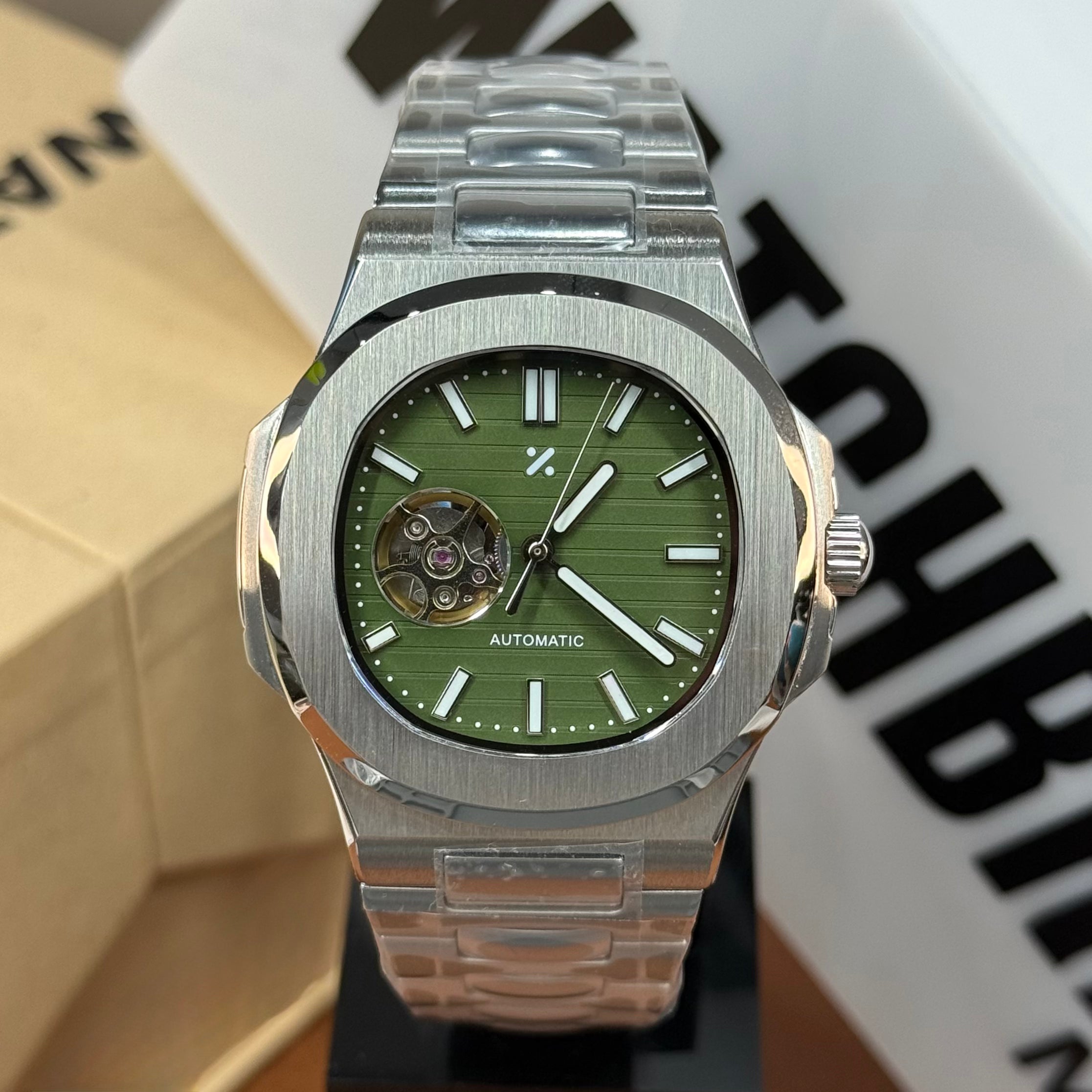 NAUTIKO | Emerald Open-Heart NH38